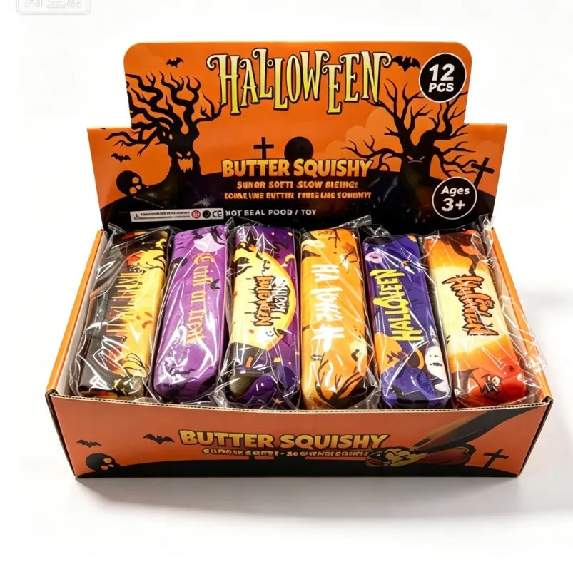 SquishStudio Halloween butter squishy toy collection in a display box featuring 12 individually wrapped slow-rising toys
